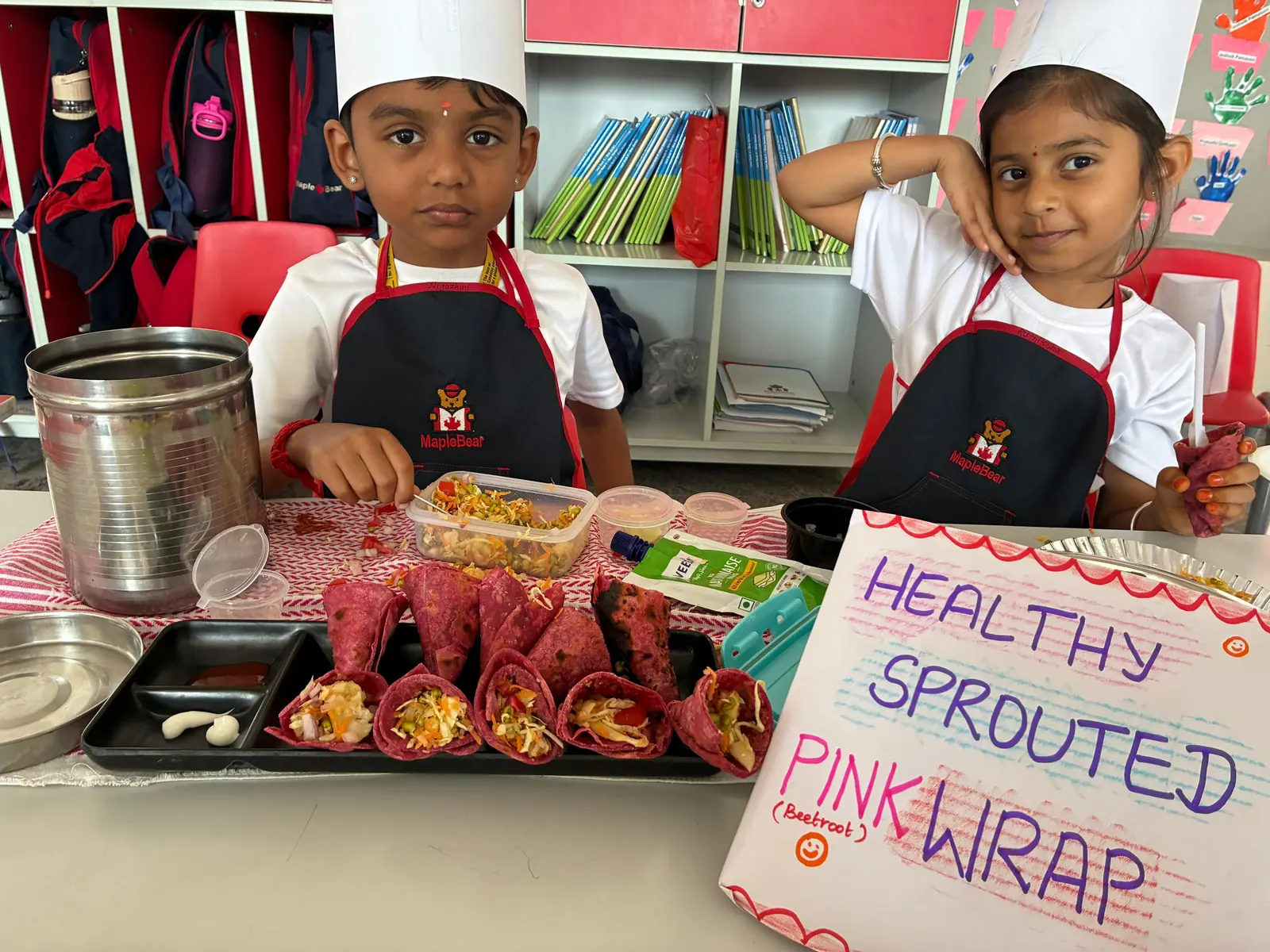 Students preparing healthy sprouted-grain wraps during a cooking activity