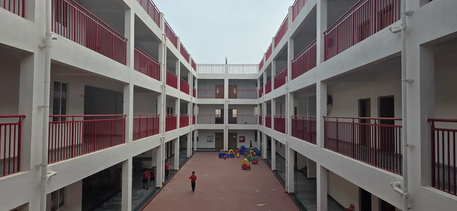 Open central courtyard surrounded by classroom corridors