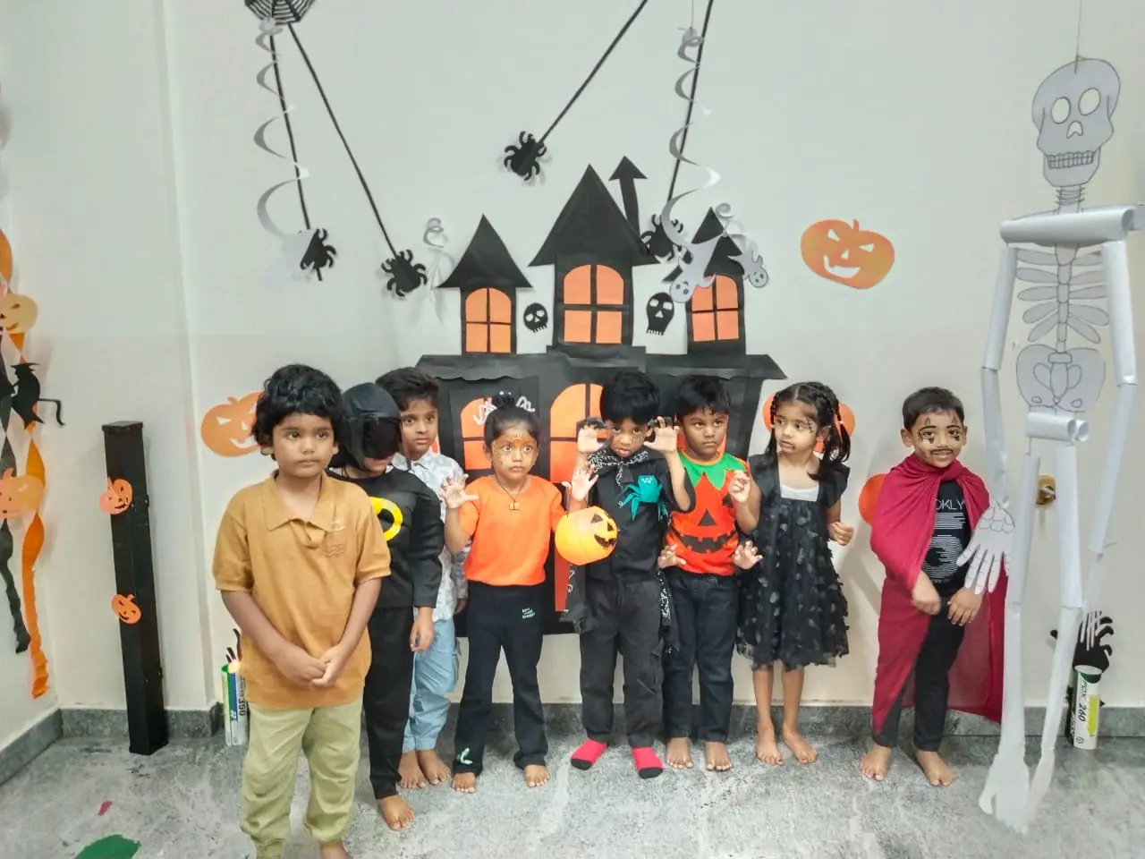 Students dressed in costumes for a Halloween celebration