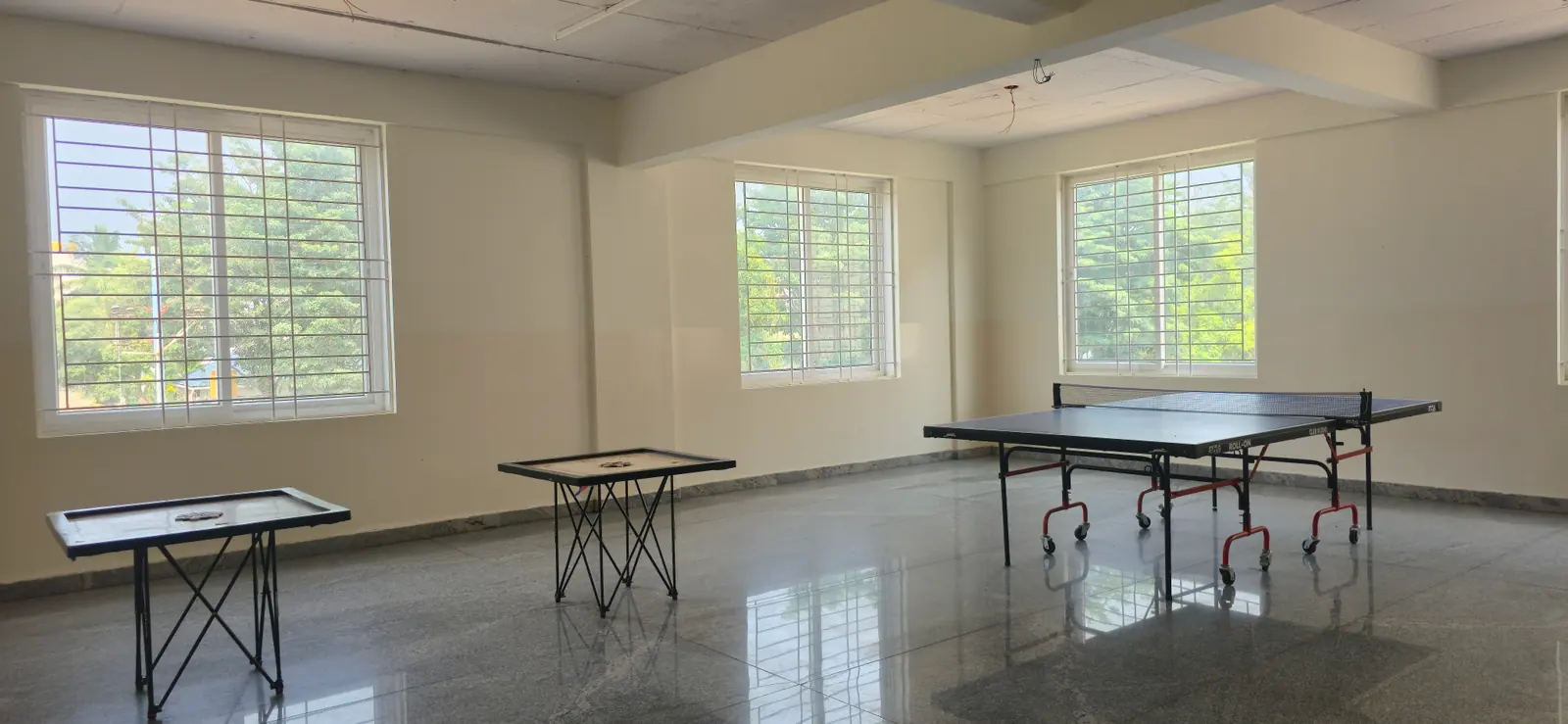 Indoor activity room with a table tennis table