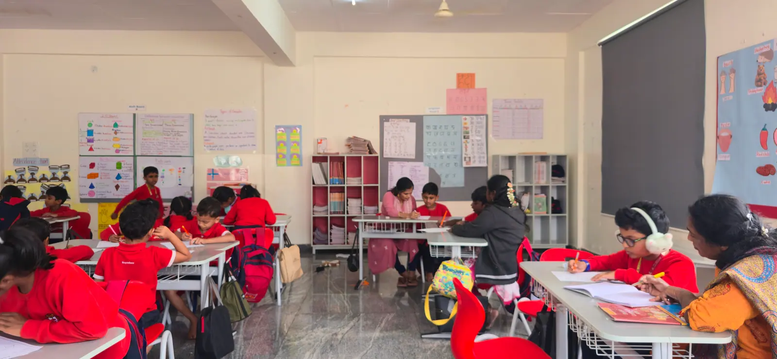 A teacher reading with a group of students