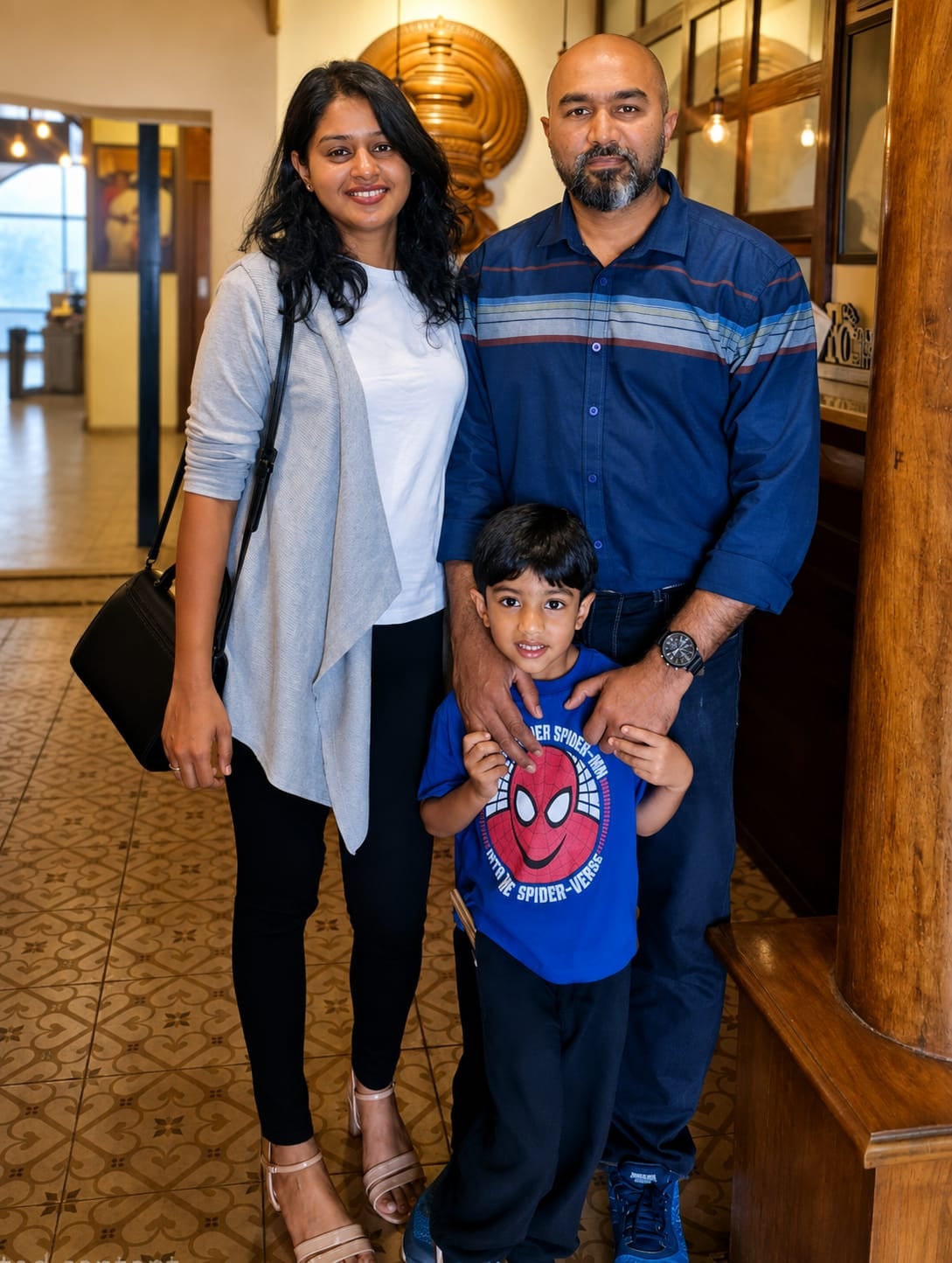 Family portrait of Luca Abed with his parents